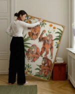 Wildlife figurative botanical nature vintage fine art print titled “Orangutan slow days in the orange grove” by Uma Gokhale for contemporary interiors